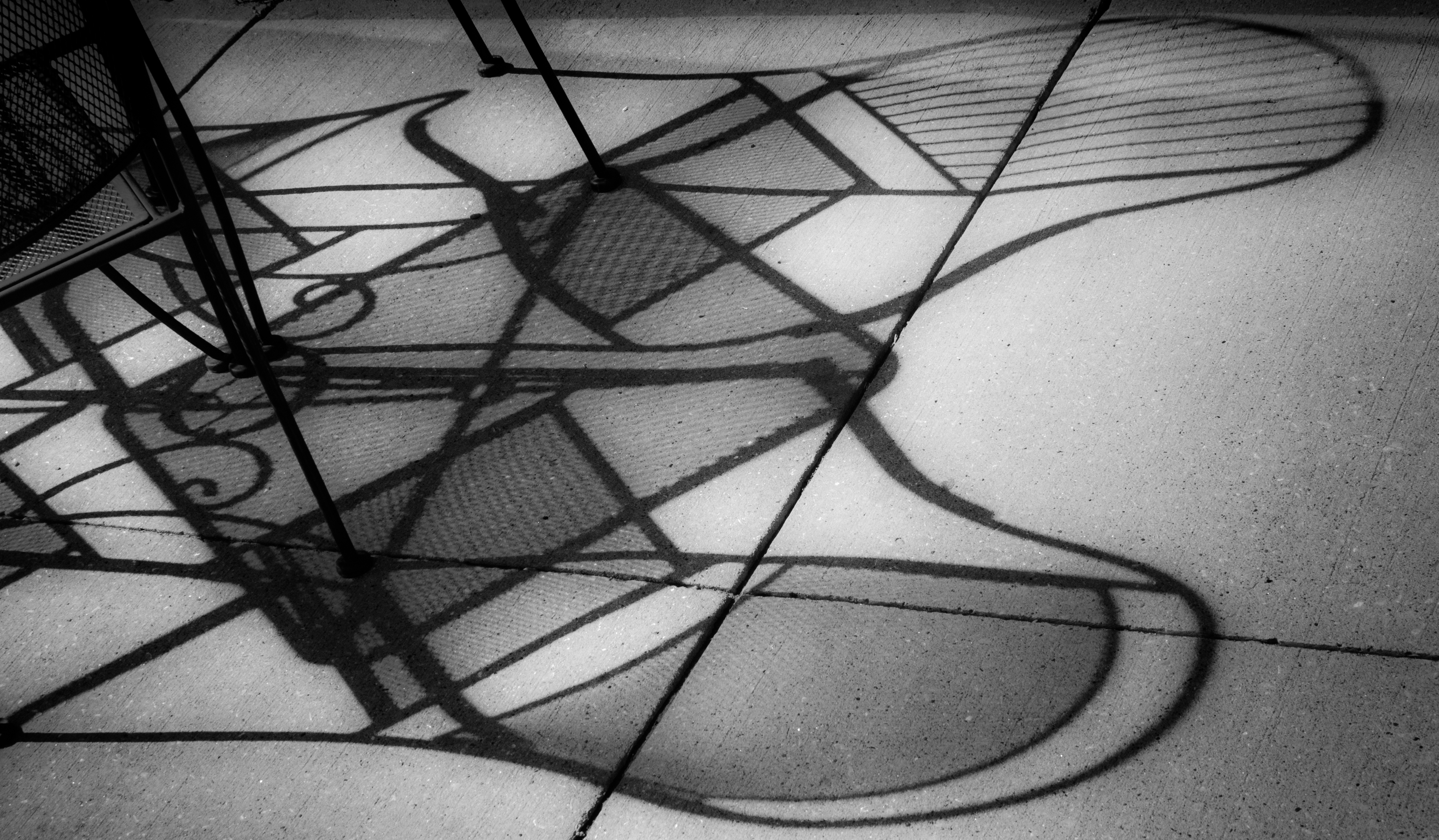 Shadows of Wrought Iron Chairs